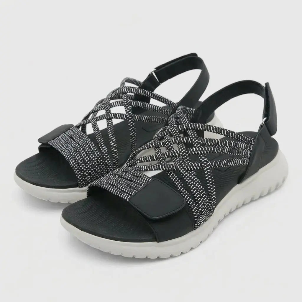 Isla orthopedic criss-cross sandals for women, designed for adjustable comfort, foot support, and everyday wear.