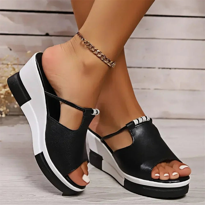 Stylish women's Isla orthopedic wedge sandals, adjustable for supportive summer comfort.