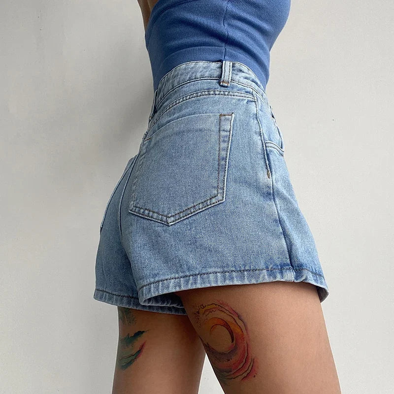 Distressed denim skort for women, featuring a stylish crossover design and practical shorts underneath.
