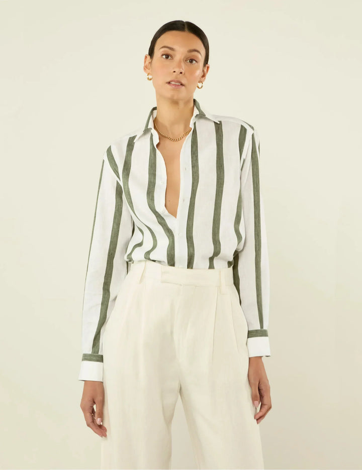 Stylish women's khaki striped long sleeve button-up shirt, a versatile relaxed fit casual top.