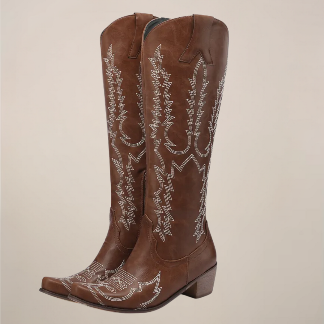 Stylish women's knee-high western boots. Classic cowboy design, pull-on fit, and comfortable block heel.