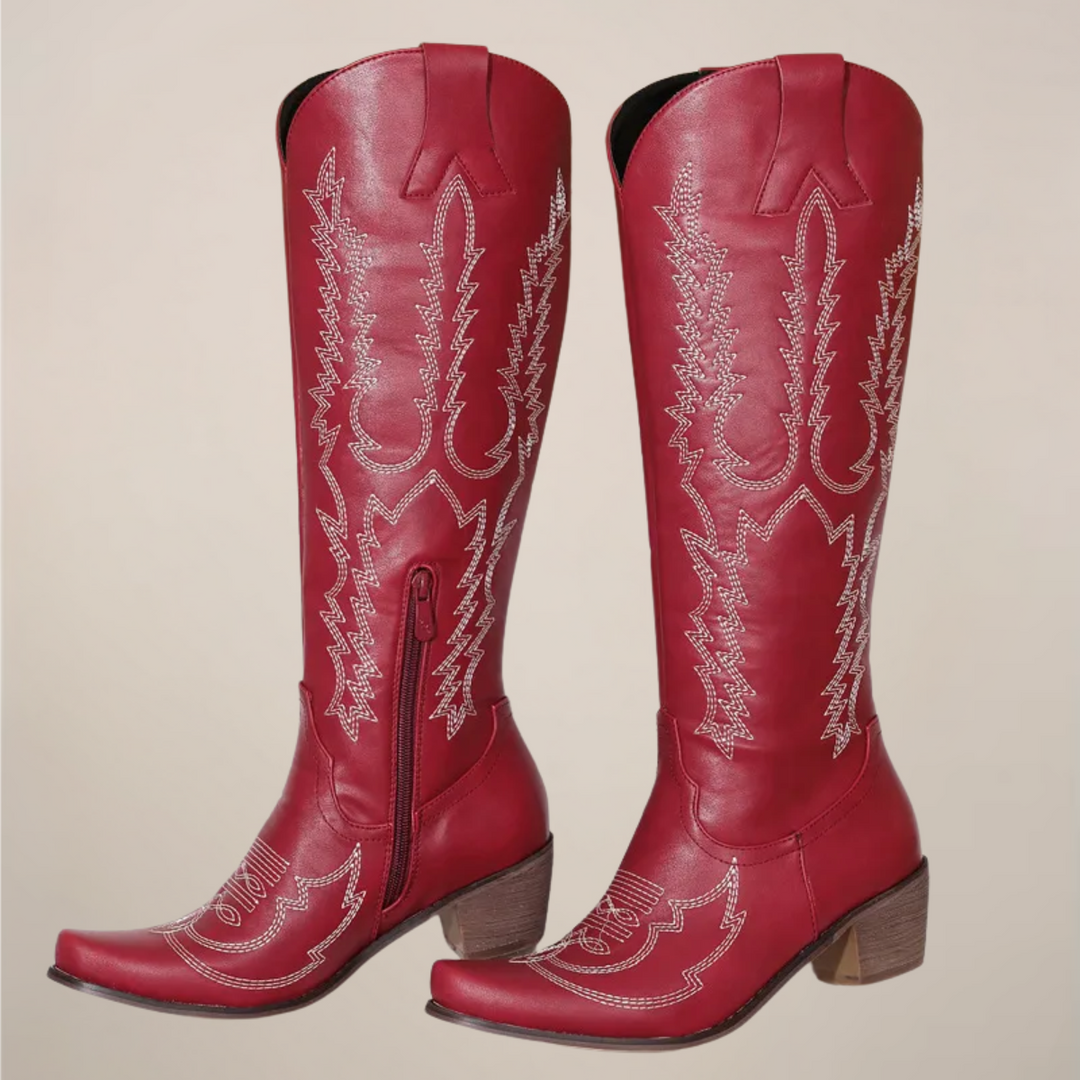 Statement women's knee-high western boots. Detailed embroidery on authentic cowboy boots with a block heel.