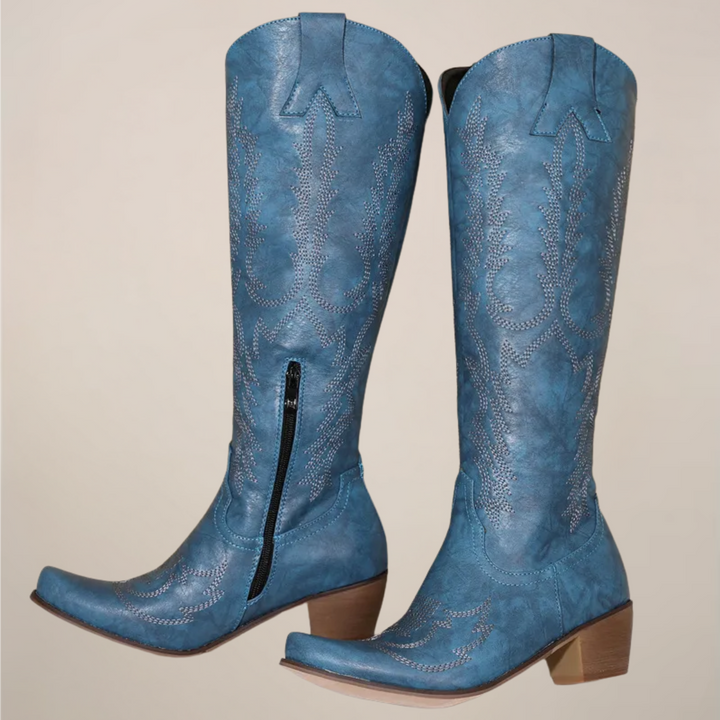 Effortless women's knee-high cowboy boots. Western pull-on style with elegant embroidery and a comfortable block heel.