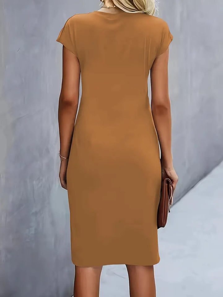 Formal women's workwear dress, knee-length sheath style with a sophisticated ruched waist.