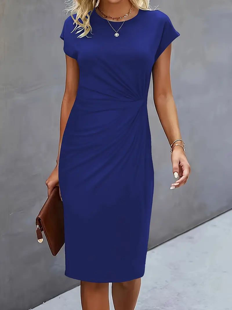 Fashionable women's knee-length dress, elegant sheath style and a modern ruched waist.