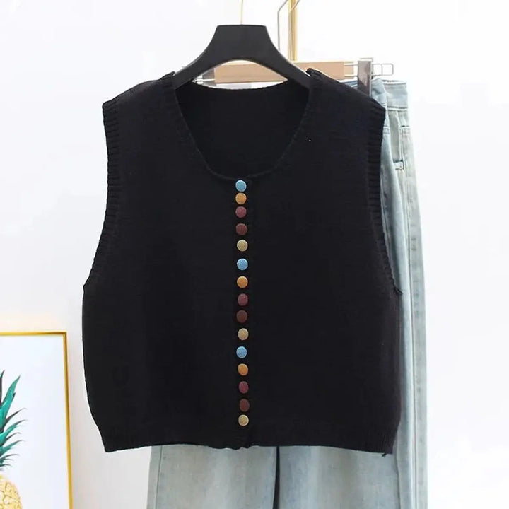 Stylish women's knit sleeveless vest cardigan, button-front design. A comfortable, seasonless piece for any wardrobe.