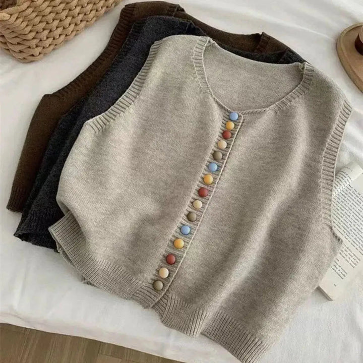 Soft knit women's sleeveless vest cardigan with button front. A comfortable, versatile layering piece for all seasons.
