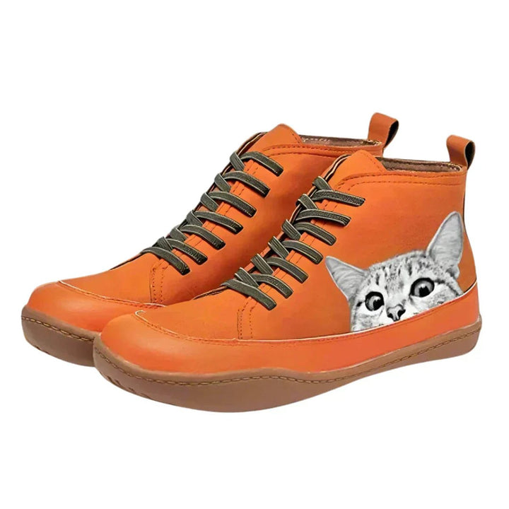 Women's lace-up ankle boots featuring a playful cat print. Perfect autumn & winter footwear for cat lovers.