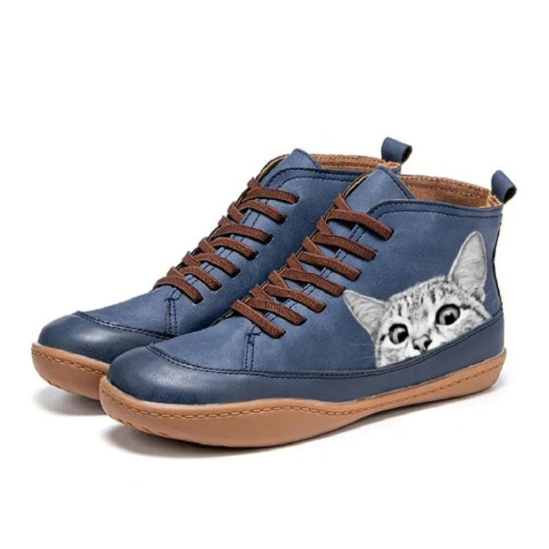 Fashionable women's ankle boots with a cute cat motif print & lace-up design. Great novelty footwear for cat fans.