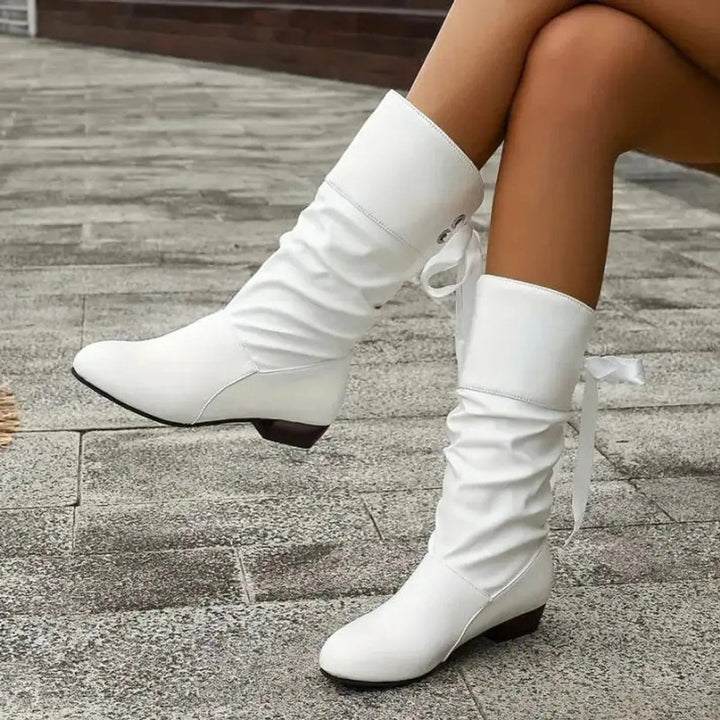 Women's lace-up ruched mid-calf boots with block heel. Comfortable & stylish for everyday fashion.