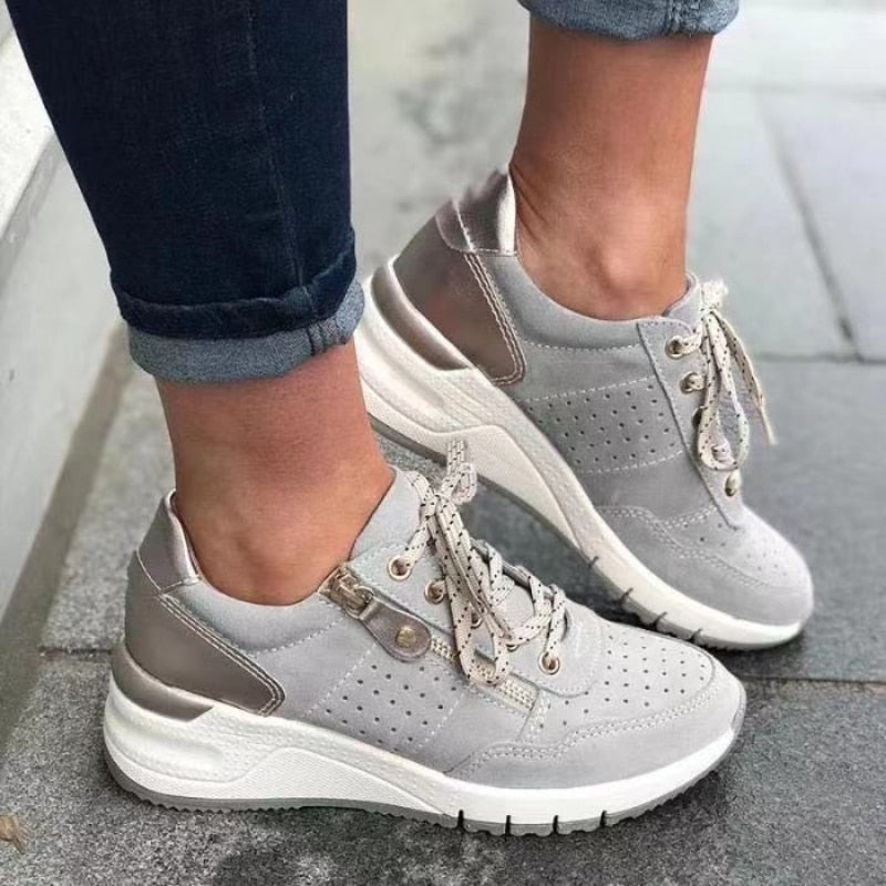 Trendy women's wedge platform sneakers with lace-up front & side zip, designed for comfort & style.