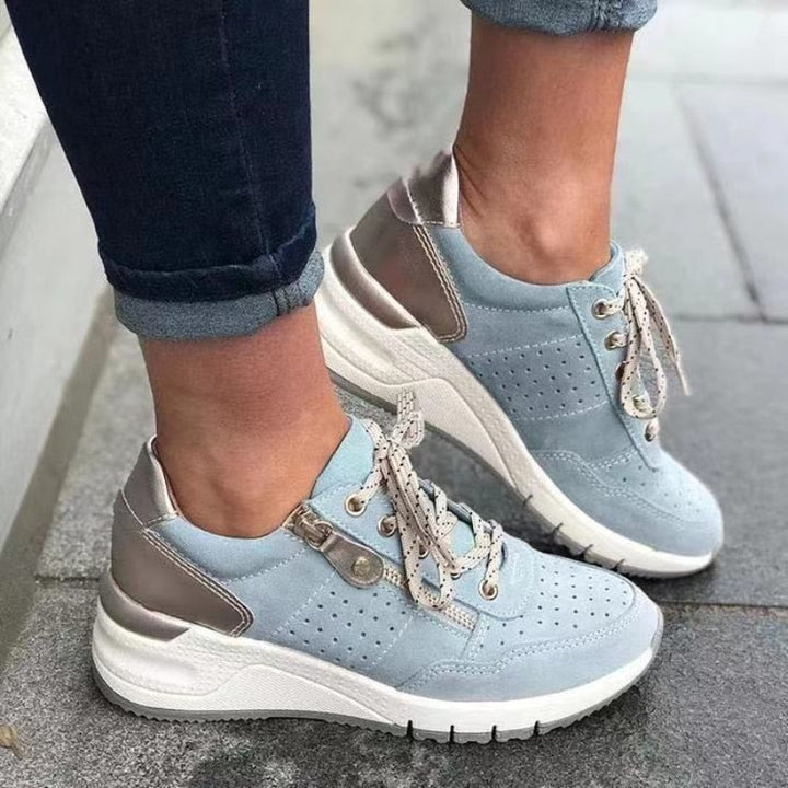 Everyday casual women's wedge platform sneakers, with lace-up closure, side zip, & comfort support.