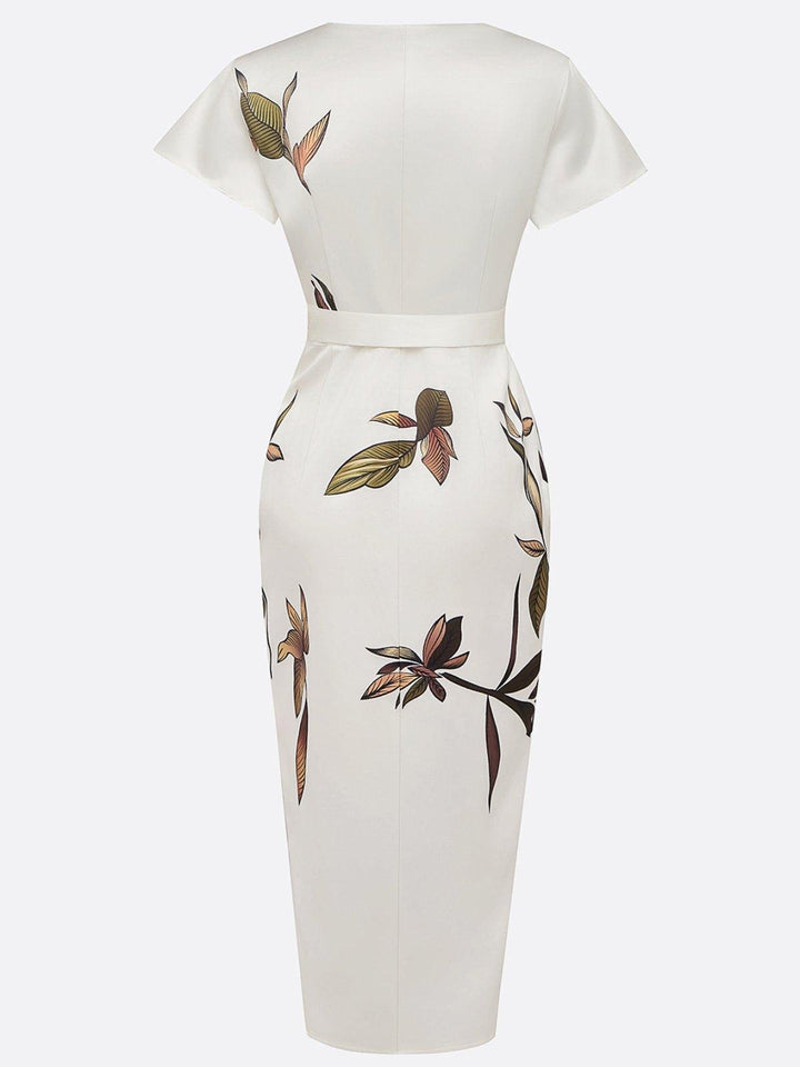 Comfortable women's leaf print short sleeve V-neck wrap midi dress with tie waist, ideal for summer fashion.