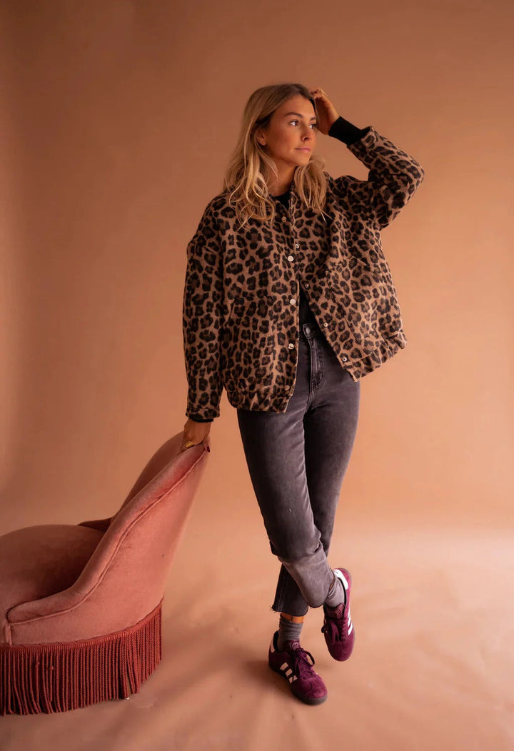 Effortless statement women's animal print bomber jacket. Versatile outerwear for a modern and trendy style.