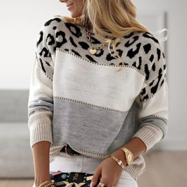 Relaxed fit women's sweater for autumn. Leopard print, chic color block pattern & comfortable ribbed cuffs.