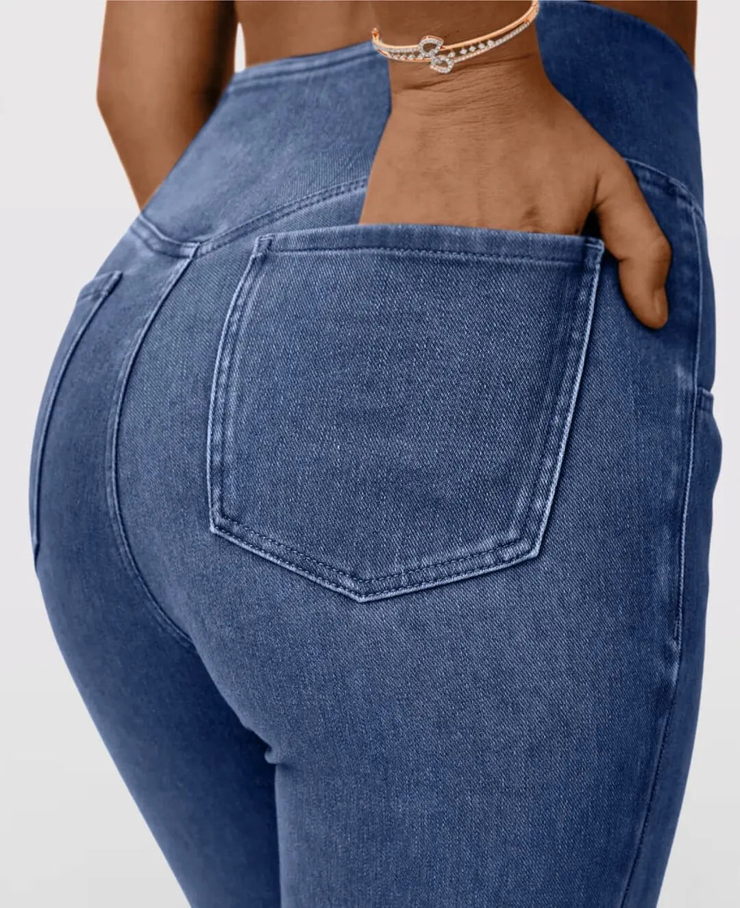 Grey women's high-waist stretch jeans, slim fit for ultimate comfort & style.