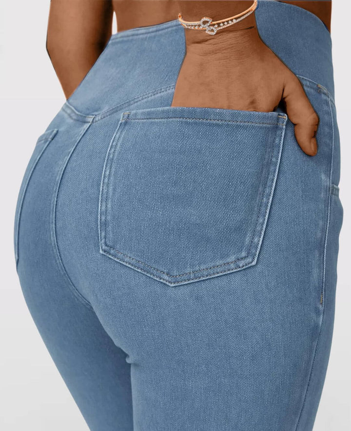Dark blue women's high-waist stretch jeans, slim fit, comfortable for any occasion.