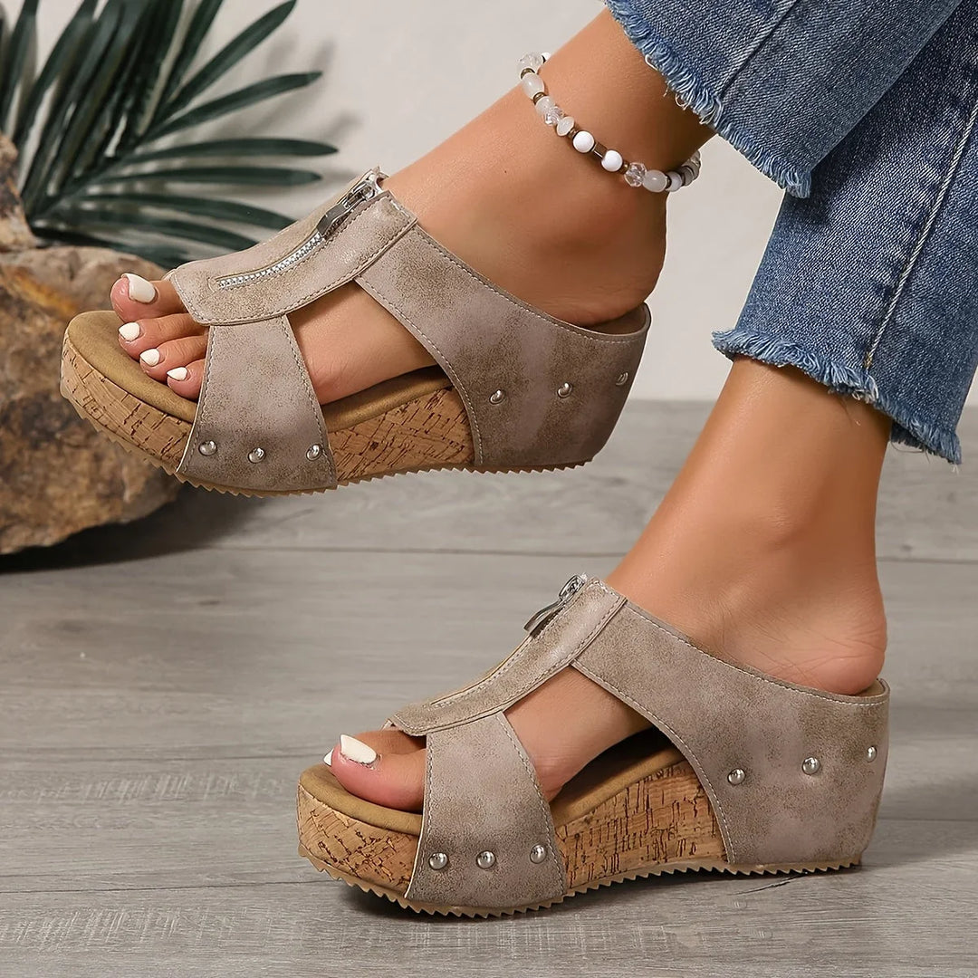 Light brown platform wedge sandals for women, featuring a chic open-toe and slip-on style.