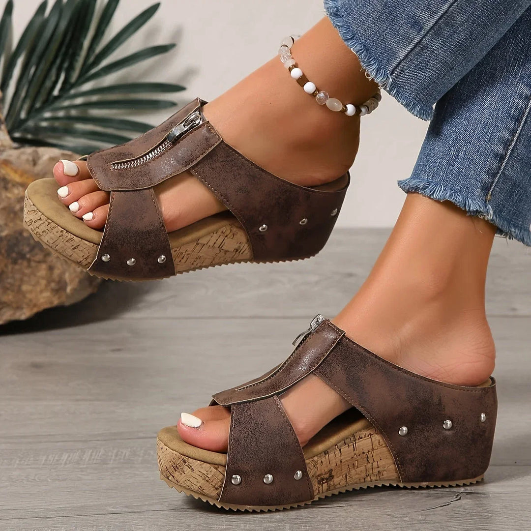 Durable black women's platform wedge sandals, open-toe and slip-on style for daily wear.