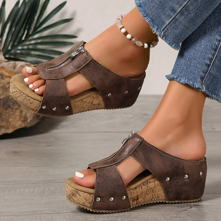 Durable black women's platform wedge sandals, open-toe and slip-on style for daily wear.