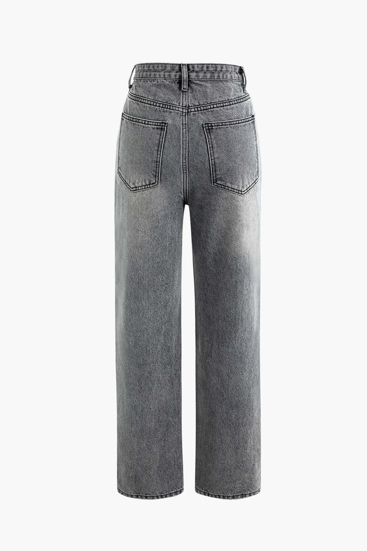 Asymmetric light wash denim high-waisted straight-leg jeans for women, offering a unique and modern style.