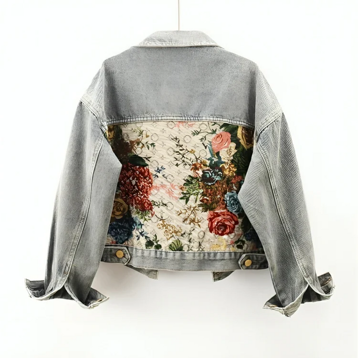 Casual women's embroidered denim jacket, featuring intricate floral patterns and a comfortable light wash.
