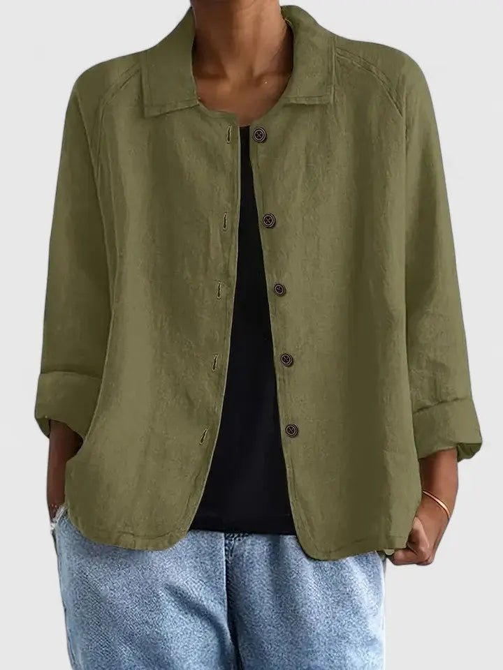 Transitional women's lightweight button-up jacket, a relaxed fit essential for any season.