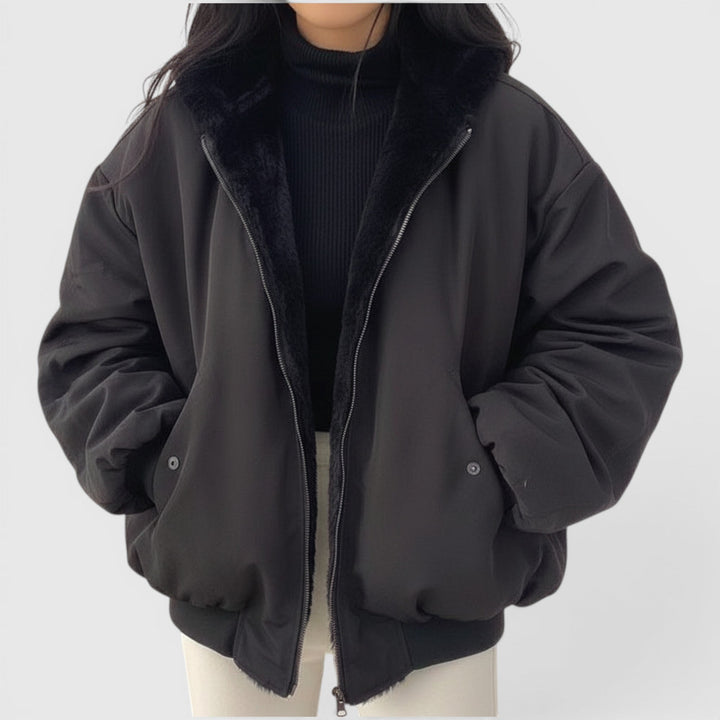 Lightweight women's bomber jacket, casual everyday outerwear offering comfort & style.