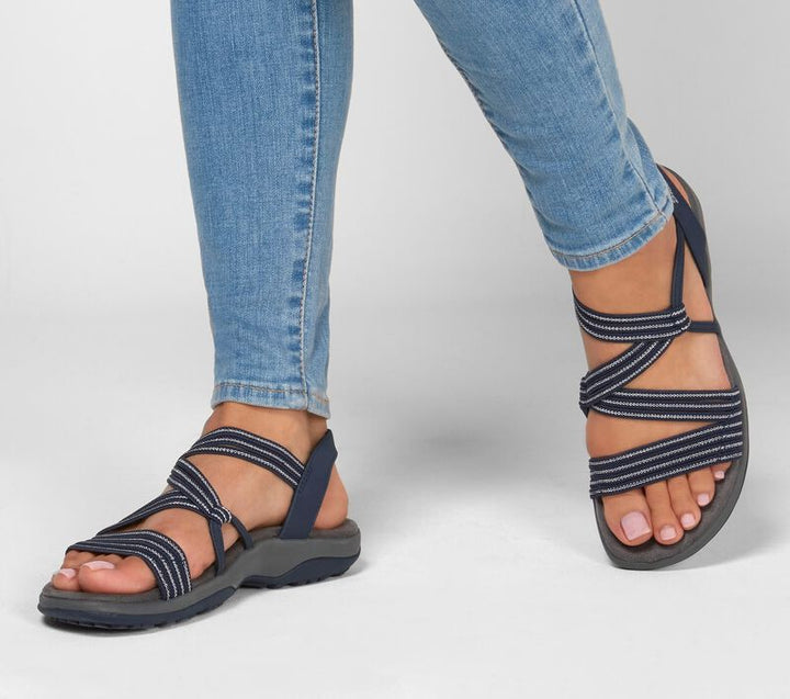 Supportive women's lightweight walking sandals with elastic straps. Features a non-slip sole for comfort.