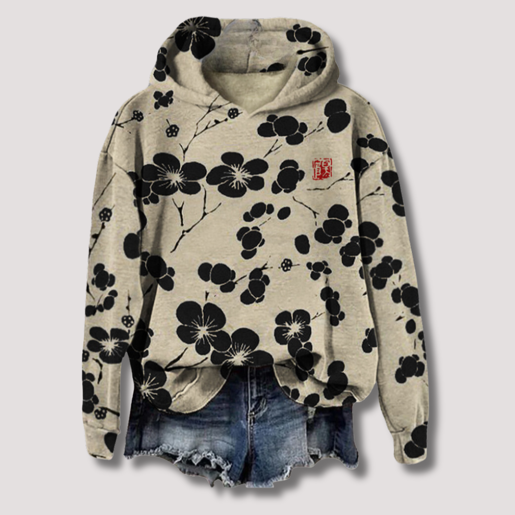 Women's lightweight floral print hoodie sweater, perfect for casual summer fashion or a trendy layering piece.