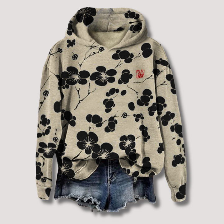 Women's lightweight floral print hoodie sweater, perfect for casual summer fashion or a trendy layering piece.
