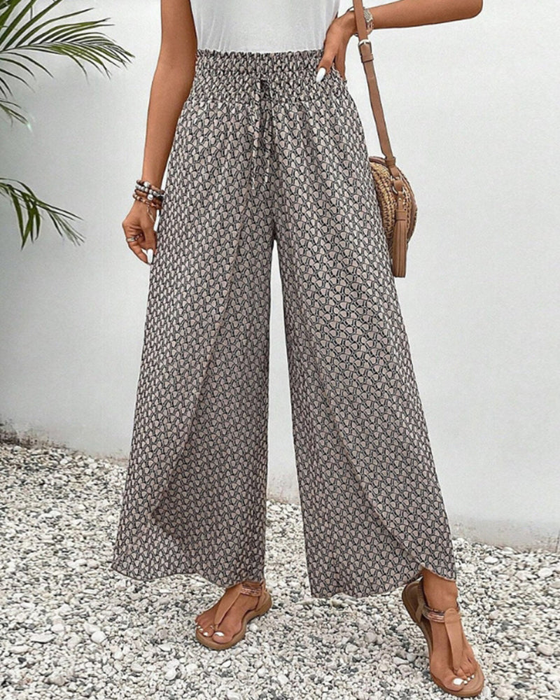Women's lightweight flowing leg trousers with comfortable elastic waist, perfect for casual spring & summer style.