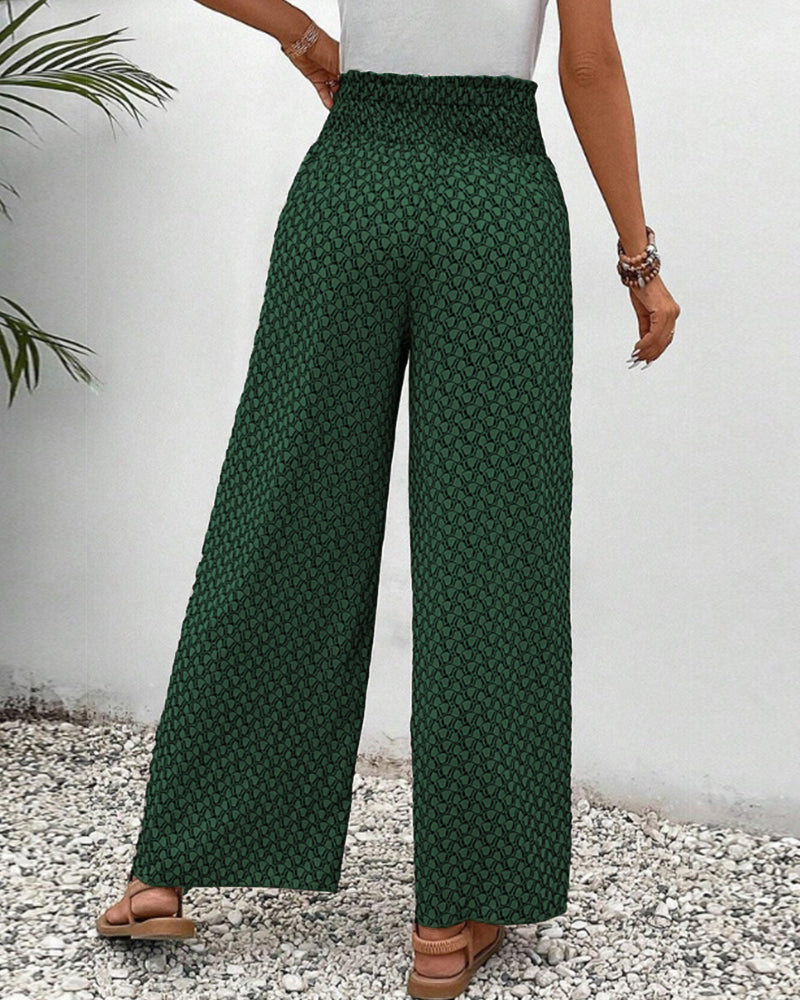 Drapey women's wide leg trousers with elastic waist, offering ultimate comfort & movement for spring/summer.