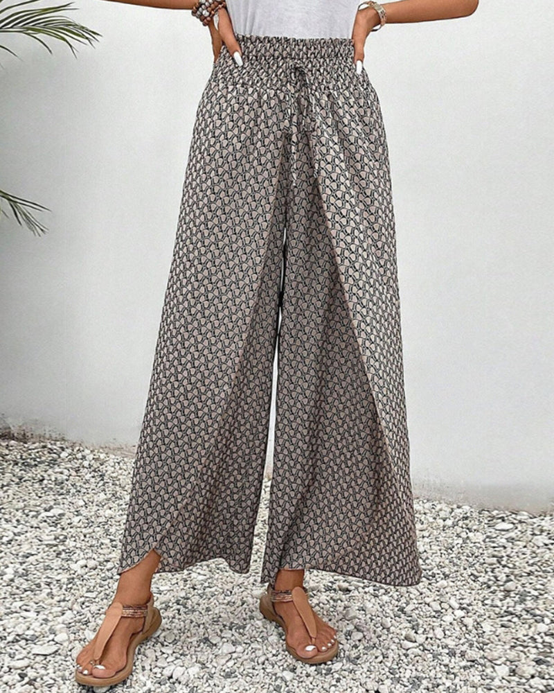 Comfortable lightweight women's casual pants with elastic waist & flowing wide legs, ideal for warm weather.