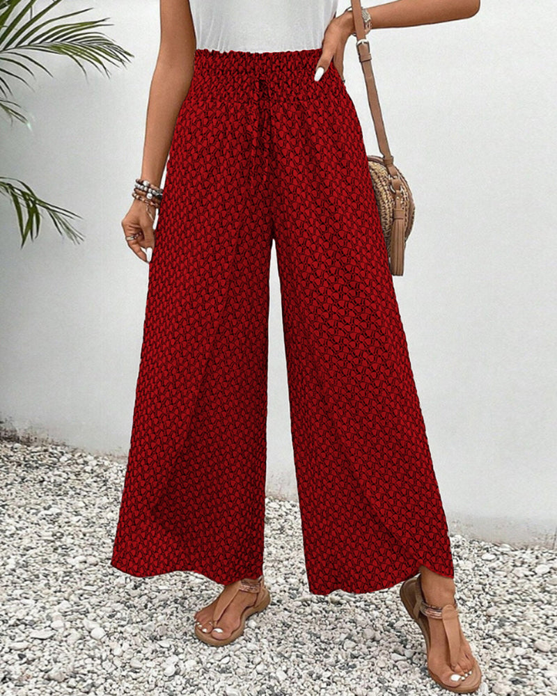 Flowing wide leg women's trousers with a comfy elastic waist, great for summer fashion & everyday wear.