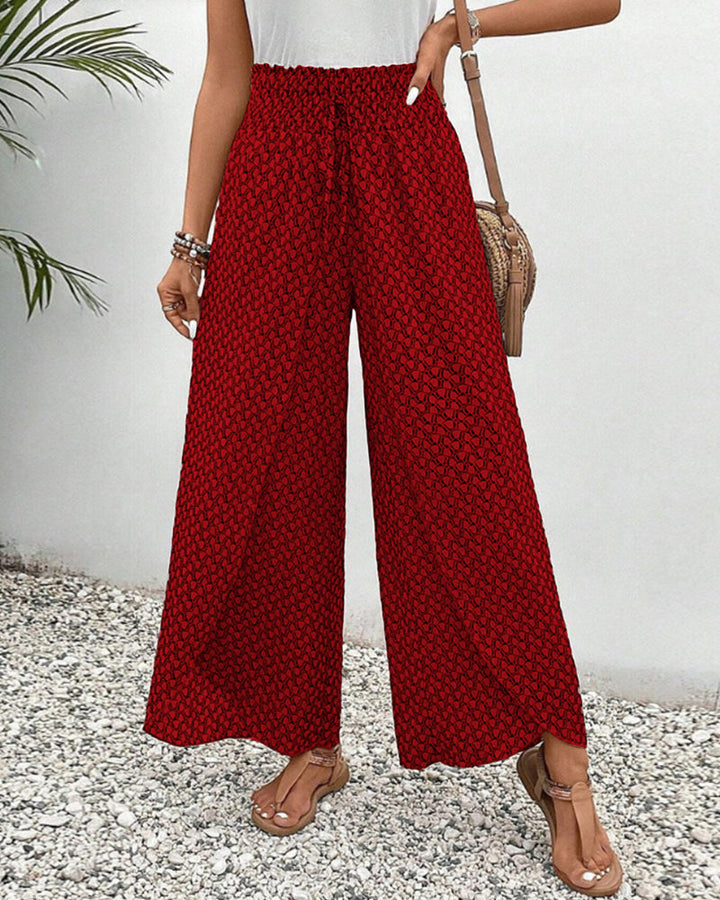 Flowing wide leg women's trousers with a comfy elastic waist, great for summer fashion & everyday wear.