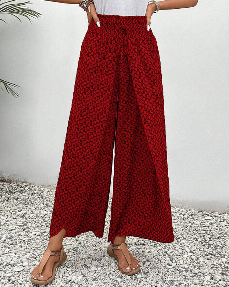 Lightweight women's trousers with a flowing silhouette & elastic waist, a must-have for chic casual outfits.