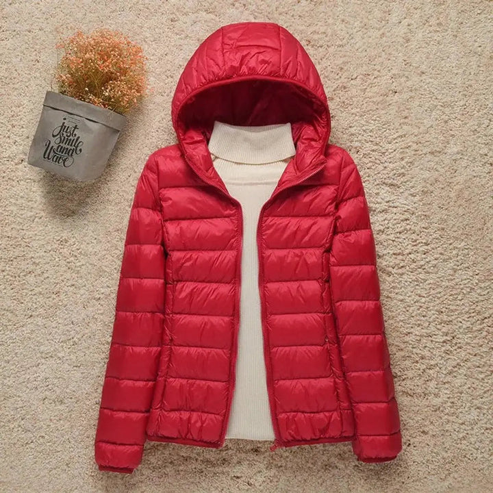 Women's autumn/winter packable puffer. Lightweight, quilted & hooded, excellent for daily casual wear.