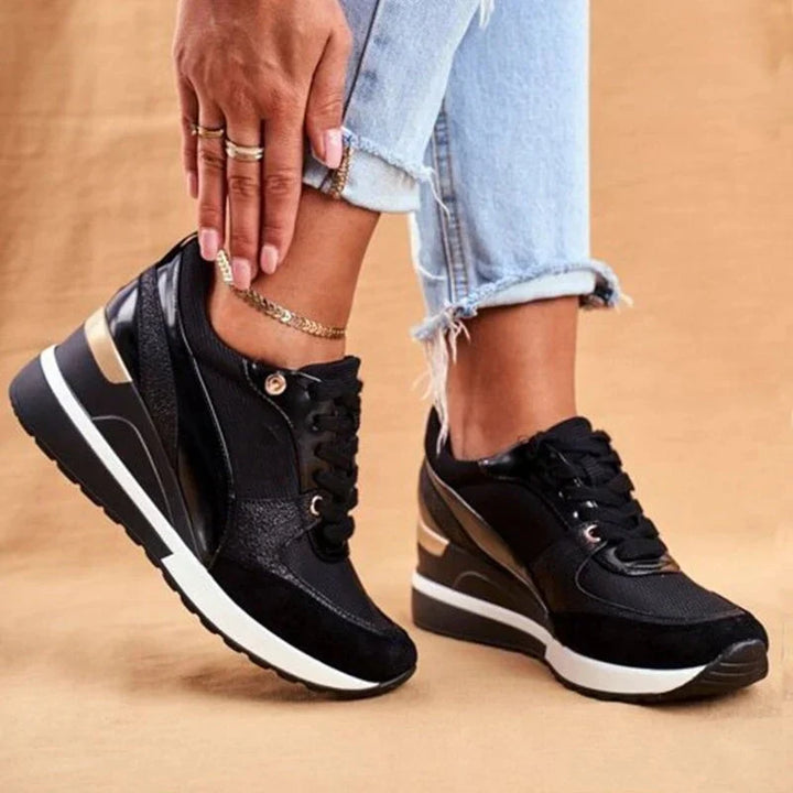 Stylish black knit women's slip-on sneakers with arch support & memory foam, perfect for casual wear.