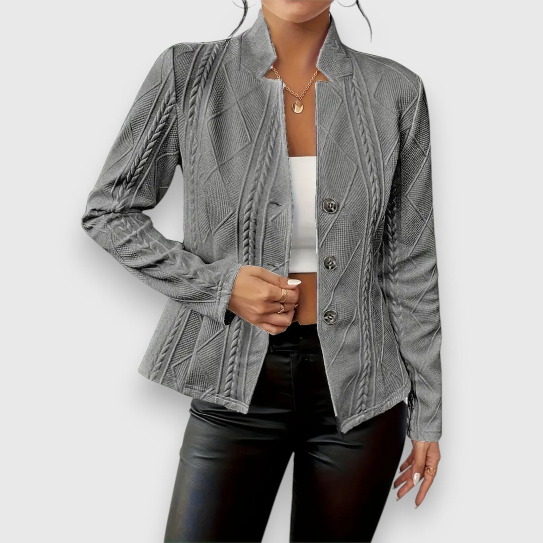 Close-up of a women's lightweight jacket featuring a full zipper & practical pockets for everyday use.