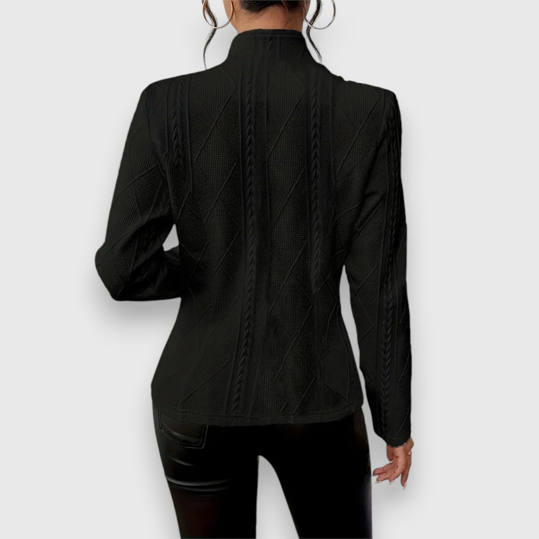 Essential women's layering jacket. Lightweight design, great for adding warmth to any spring or fall outfit.