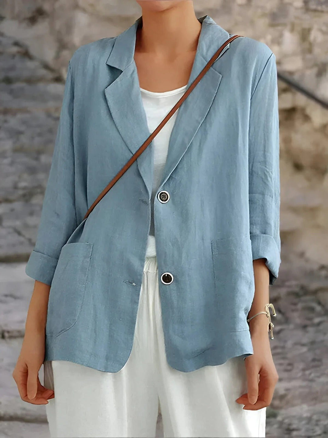 Professional women's linen blazer, lightweight & tailored for spring/summer office wear or versatile smart casual style.