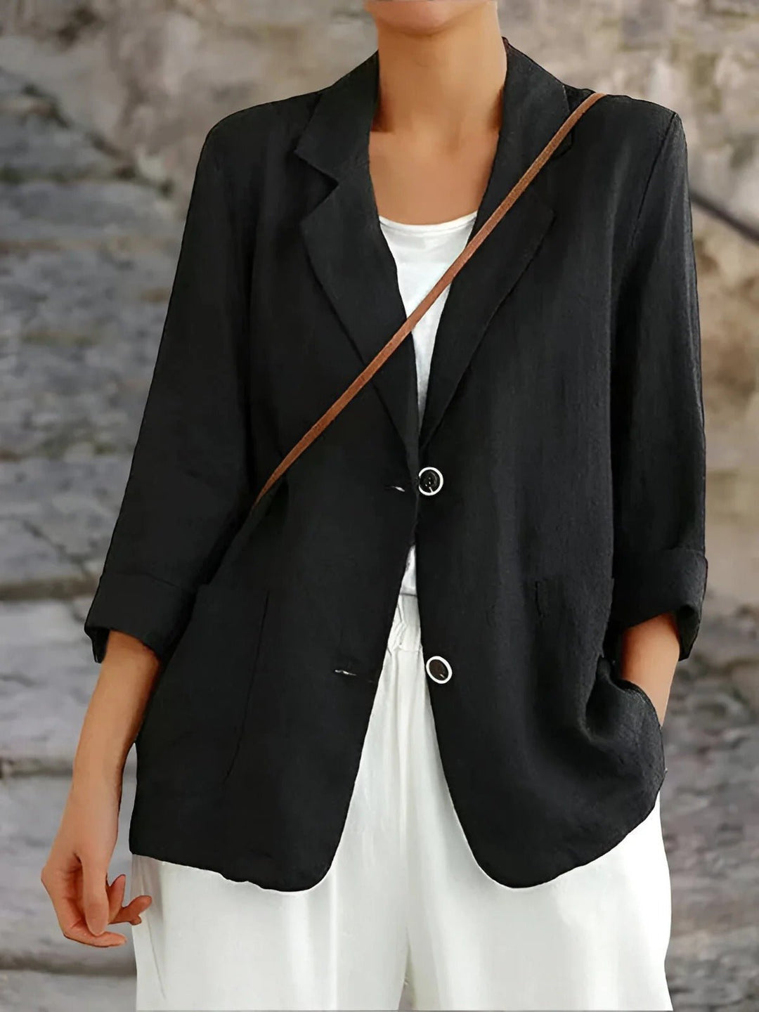 Stylish women's lightweight linen blazer, tailored fit with practical pockets for versatile professional & smart casual looks.