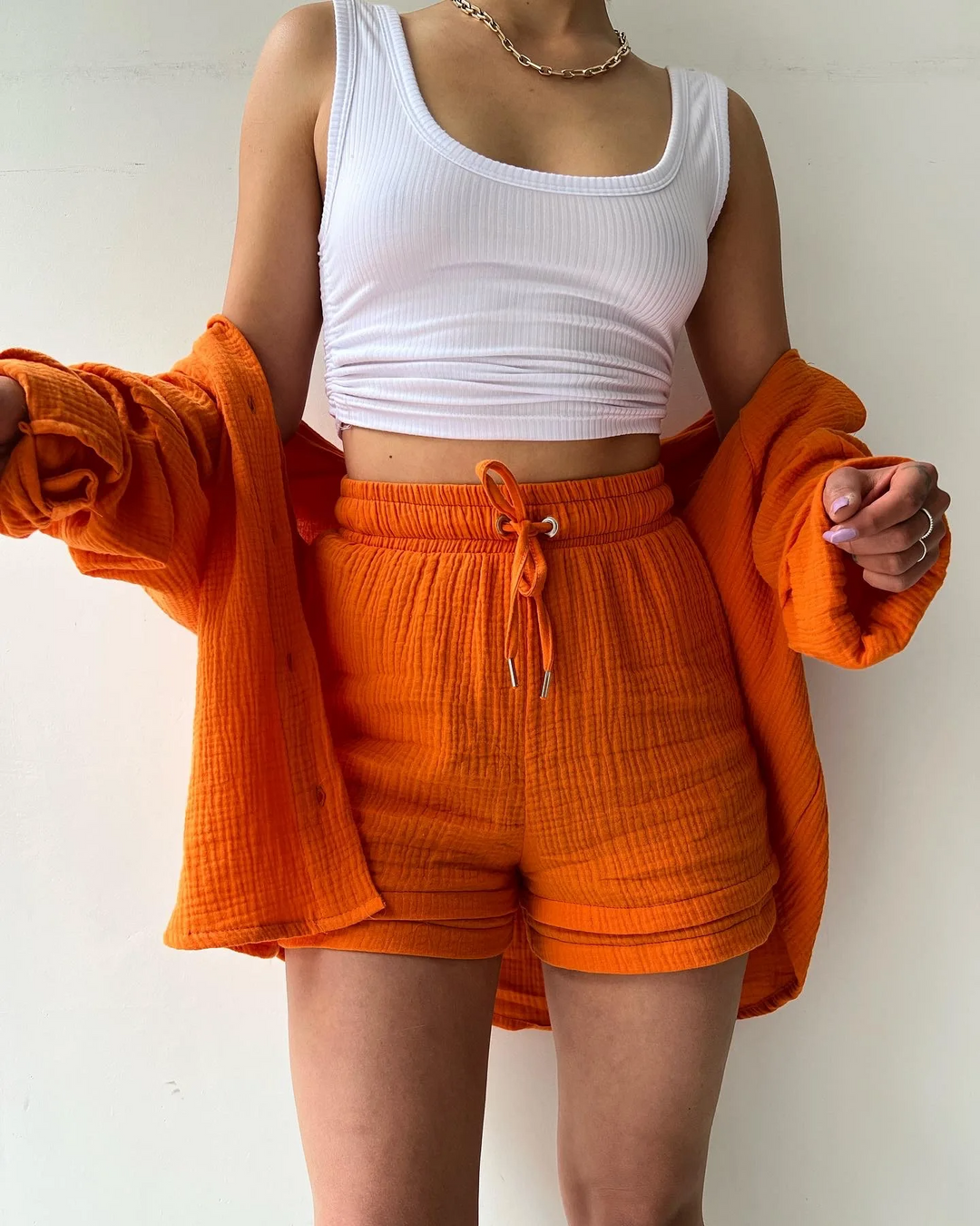 Relaxed fit women's lounge set with breathable shorts, great for casual & home wear in spring.