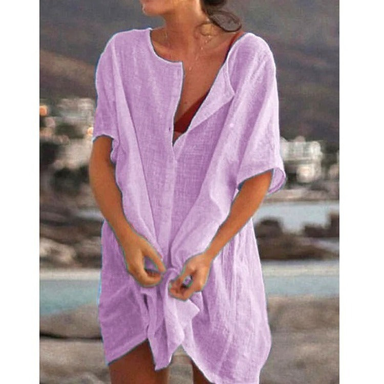 Elegant women's midi dress for vacation, serving as a fashionable beach dress and practical swim cover-up.