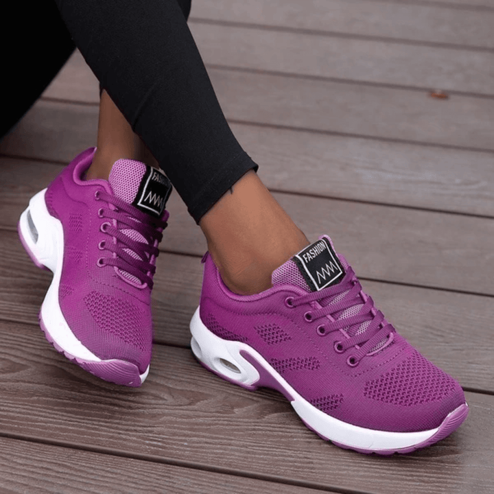 Athletic women's walking shoes, lightweight & orthopedic for superior comfort and foot support.