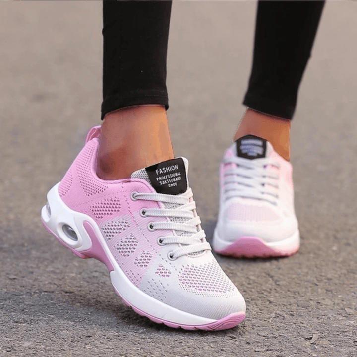 Comfortable women's running sneakers with orthopedic support, perfect for fitness & active wear.