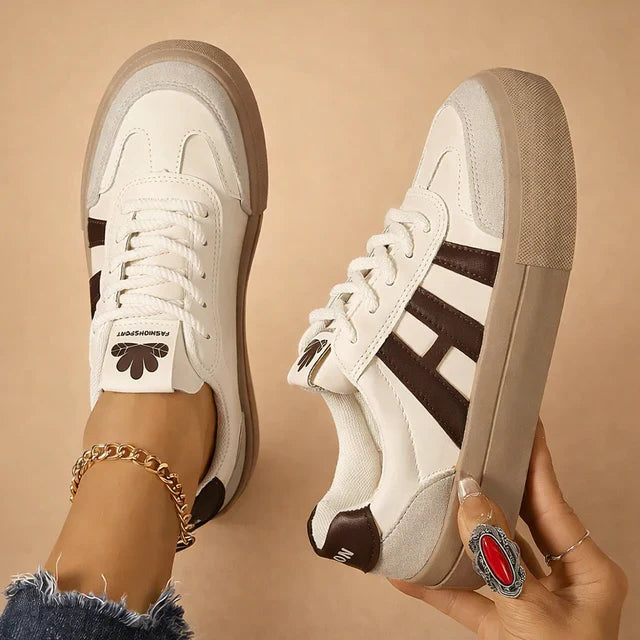 Stylish women's platform trainers, versatile for everyday wear. Comfortable low-top fashion sneakers with laces.