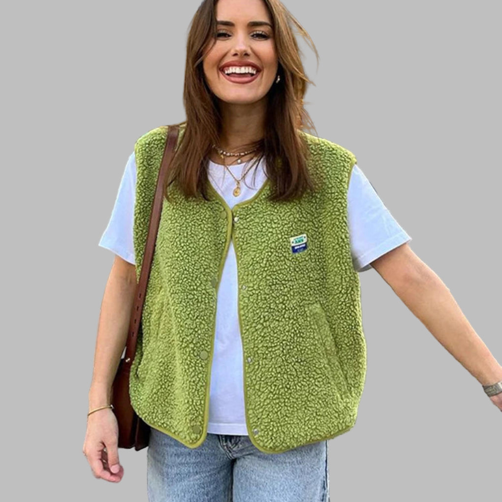 Stylish women's lightweight button-up vest for easy layering. A versatile polyester fashion piece for comfort.