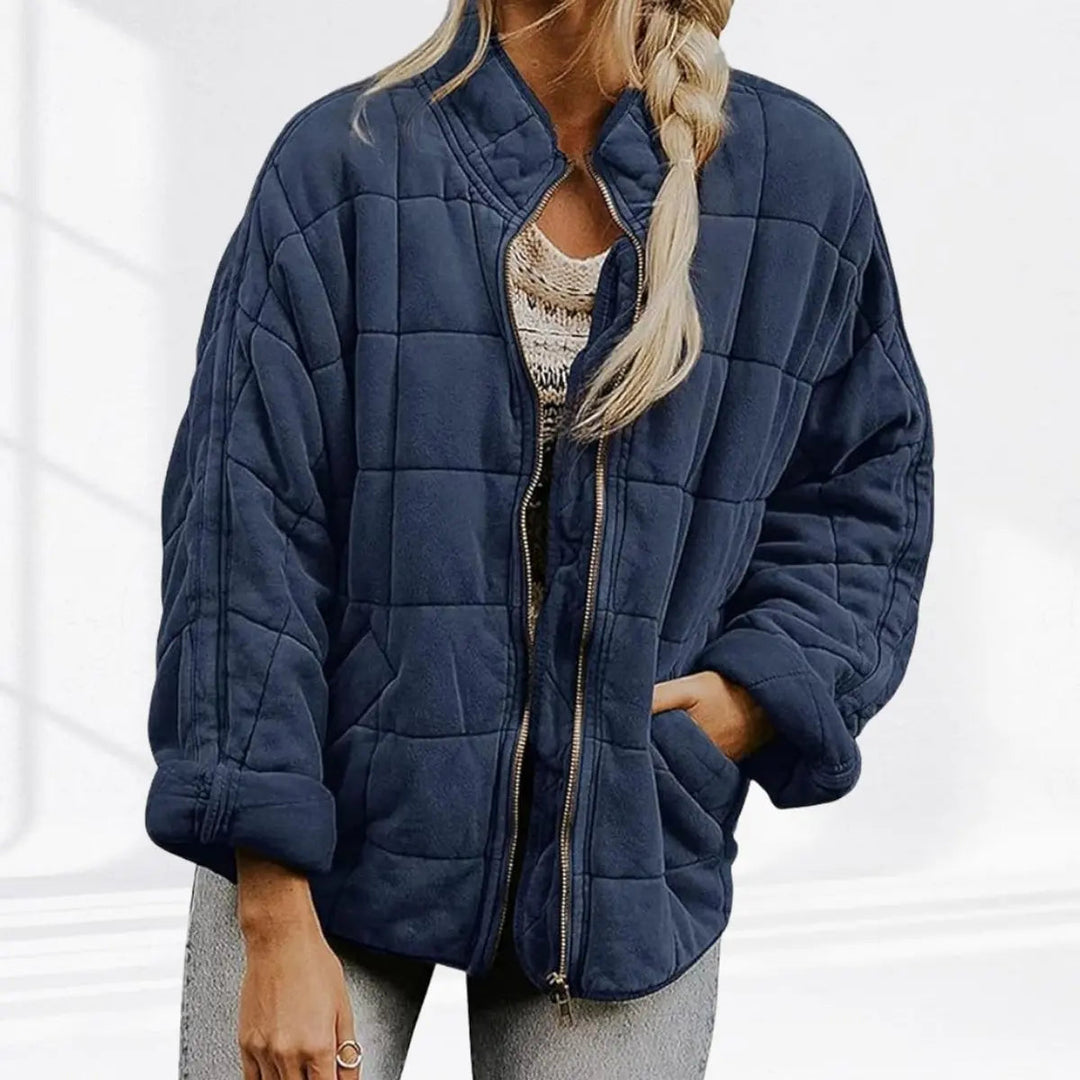 Women's lightweight quilted jacket, perfect for layering. Zip-up front & stand collar. Versatile casual fall outerwear.